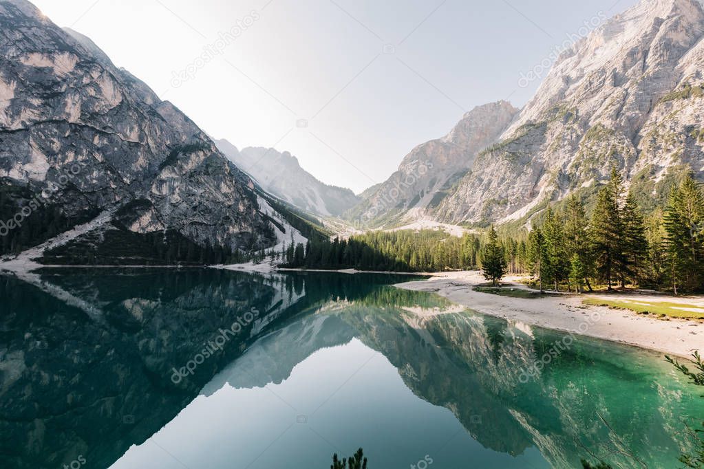 scenic view of fascinating clear lake in mountains, Lago di Braies, Italy