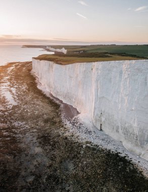 Yedi kız kardeşin manzarası, Uk.