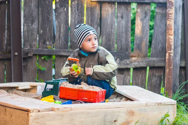 Boy Striped Hat Playing Sandbox Yard — Stock Photo, Image