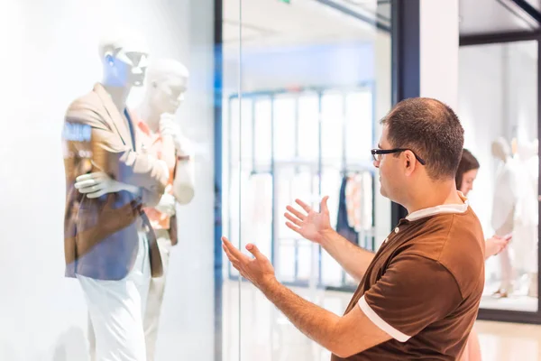 Young Man Stands Window Clothing Store — Stock Photo, Image