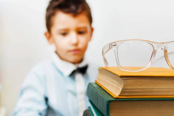 Glasses Stack Books Boy Background Blurred — Stock Photo, Image