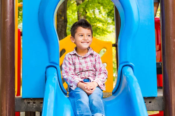 Boy Riding Slide Playground — Stock Photo, Image