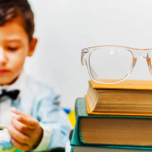 Glasses Stack Books Boy Background Blurred — Stock Photo, Image