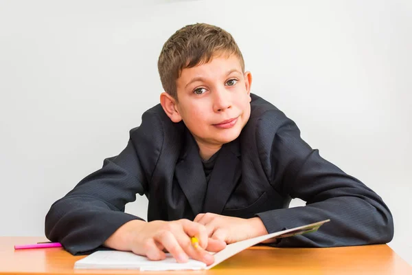 Alegre Chico Escritorio Haciendo Tarea —  Fotos de Stock