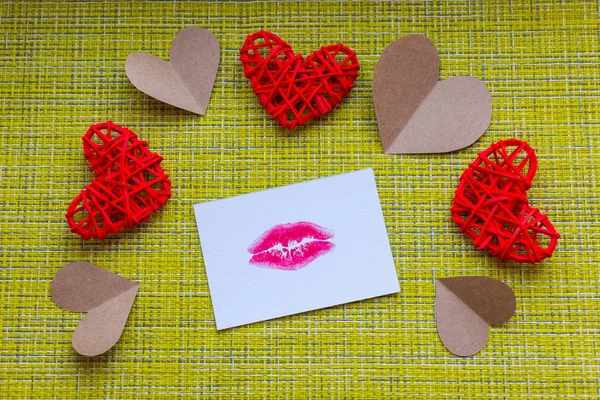 woman\'s lip print and hearts. concept of Valentine\'s day