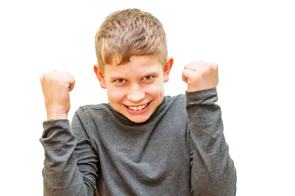 Dospívající chlapec. gesta vítězství. na bílém pozadí izolované — Stock fotografie