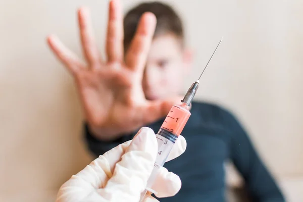 Close-up da seringa vacinações para crianças . Fotos De Bancos De Imagens
