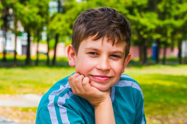 Portrait of a teenage boy in the Park in summer — Stock Photo, Image