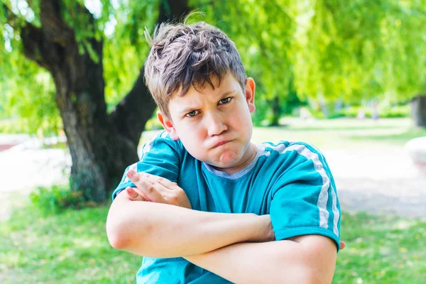 Portrait of an offended teenager outdoor — Stock Photo, Image