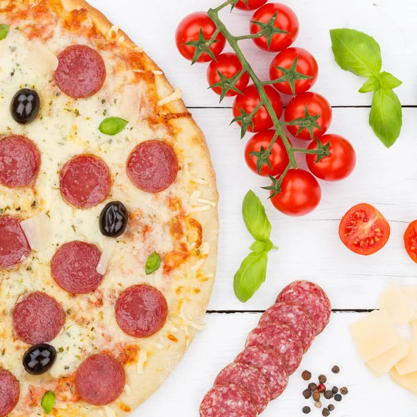 Pizza pepperoni salami from above baking ingredients square clos — Stock Photo, Image