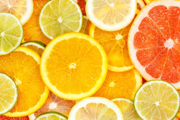 Citrus fruits collection food background oranges lemons limes gr — Stock Photo, Image