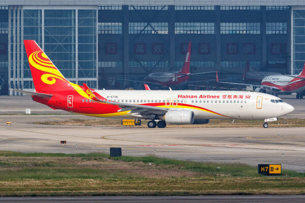 Shanghai, China - September 28, 2019 Hainan Airlines Boeing 737-800 airplane at Shanghai Hongqiao Airport (SHA) in China. Boeing is an American aircraft manufacturer headquartered in Chicago.
