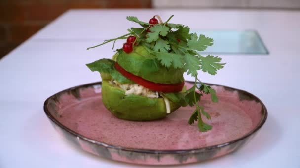 Raw food burger with avocado and celery — Stock Video