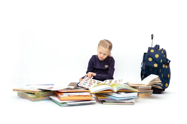 Blonde girl reads books waving her arms and covers her face — Stock Photo, Image