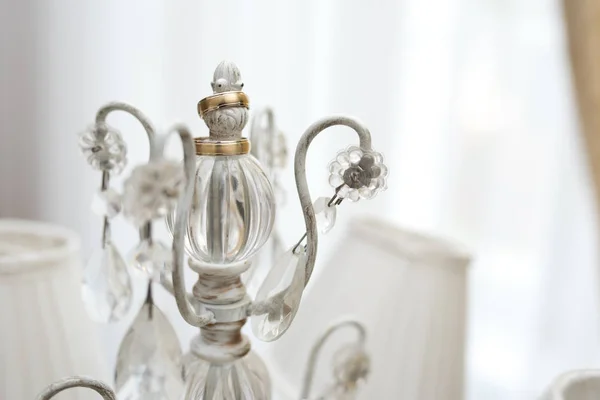 Golden Wedding Rings Placed White Candlestick Illuminated Morning Light — Stock Photo, Image
