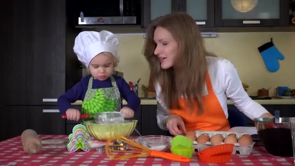 Mother Daughter Preparing Cookies Together Handheld Motion Shot — Stock Video