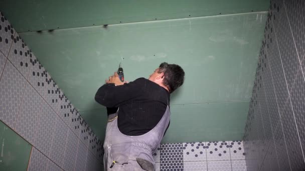 Gypsum Ceiling Fixing With Screwdriver Stock Video C Sauletas