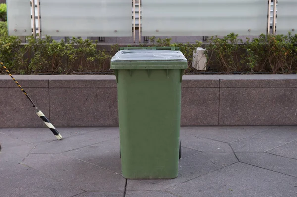 city trash can on street