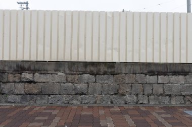 Sokak duvarı arka planı, endüstriyel arka plan, depo tuğla duvarlı boş Grunge şehir sokağı