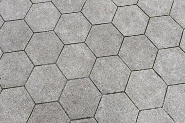 Arkaplan olarak altıgenlerin basit bir beyaz doku deseni