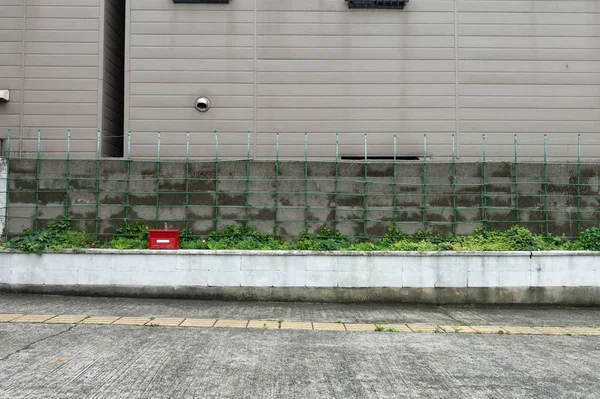 Sokak duvarı arka planı, endüstriyel arka plan, depo tuğla duvarlı boş Grunge şehir sokağı