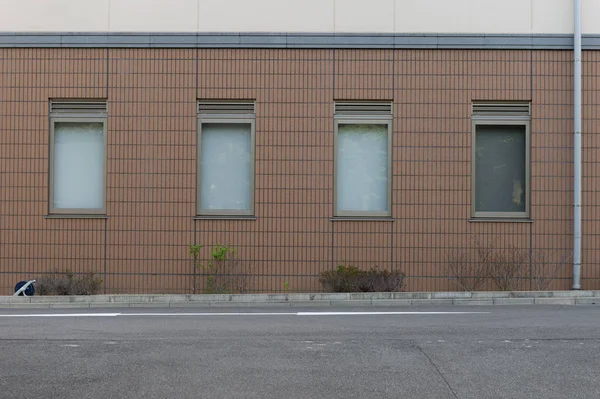 Sokak duvarı arka planı, endüstriyel arka plan, depo tuğla duvarlı boş Grunge şehir sokağı