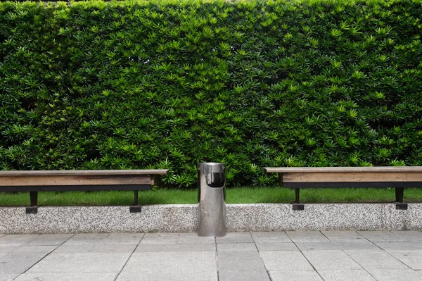 Smoking area zone. Unidentified people smoke in designated smoking area. Smoking and waking is strictly prohibited in most of the public area