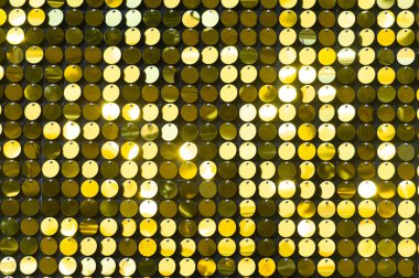 Arka plan payet. arka plan pullu. parlak yüzey aktif. Yanıp sönen ışıklar ile tatil soyut glitter arka plan. Kumaş pullu parlak renkler. Moda kumaş glitter, pullu