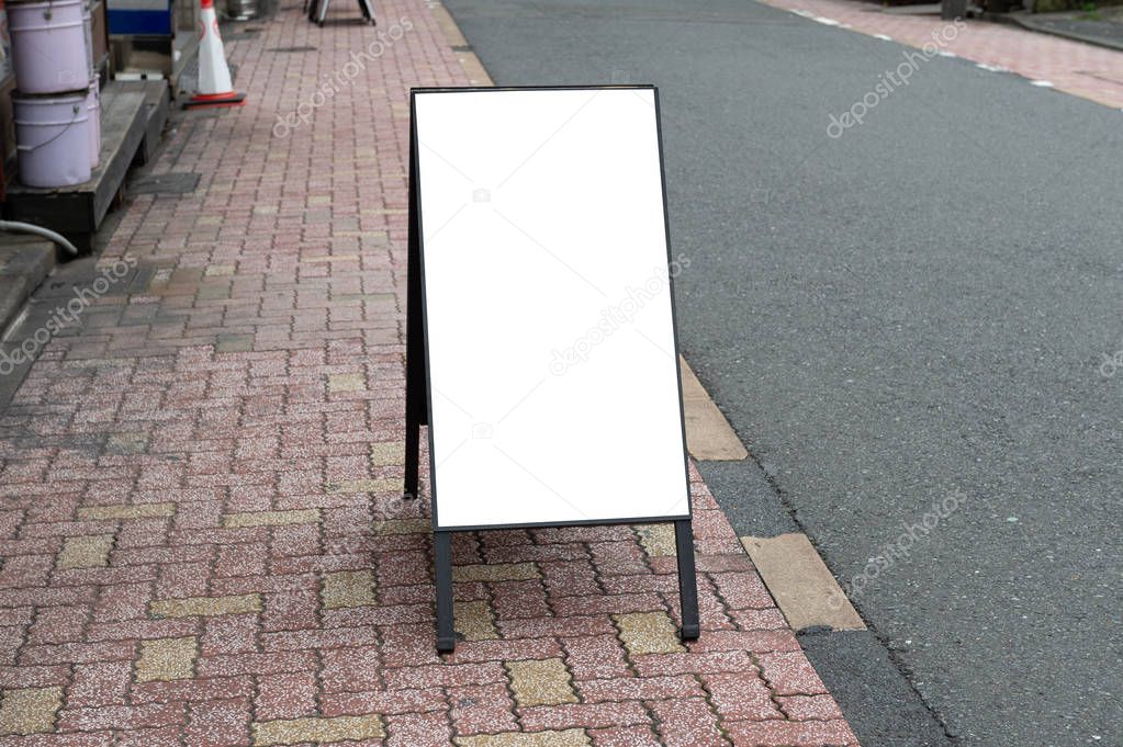 Large blank billboard on a street wall, banners with room to add your own text