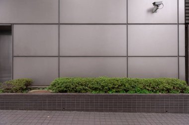 Sokak duvarı arka planı, endüstriyel arka plan, depo tuğla duvarlı boş Grunge şehir sokağı