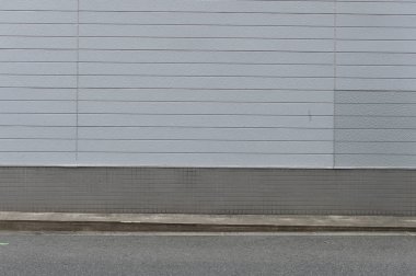 Sokak duvarı arka planı, endüstriyel arka plan, depo tuğla duvarlı boş Grunge şehir sokağı