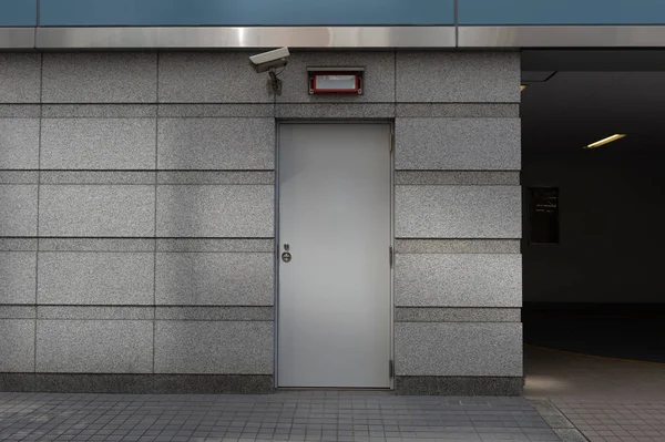 Sidewalk by street wall & door — Stock Photo, Image