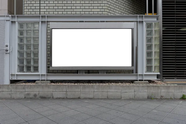 Large blank billboard on a street wall, banners with room to add — Stock Photo, Image