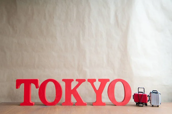 Texto Tokyo Maleta Miniatura Sobre Fondo Madera Concepto Viaje Estilo — Foto de Stock