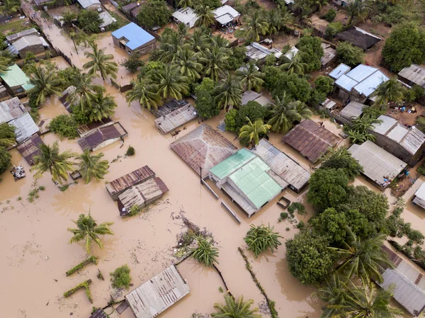 Aerial view overhead houses flooded by a cyclone