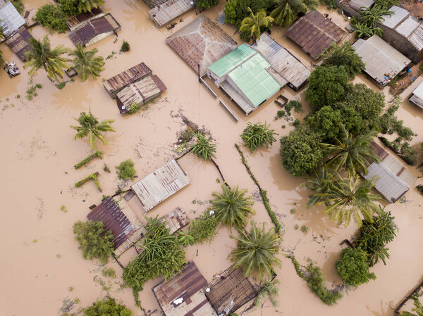 Aerial view overhead flooded houses after a cyclone