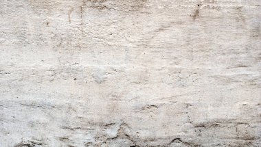 Eski evin duvarına. Yüzeyde çatlaklar. Arka plan