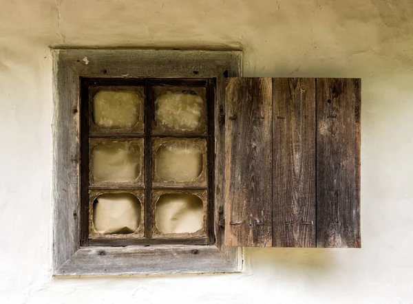 Old wooden windows with locks