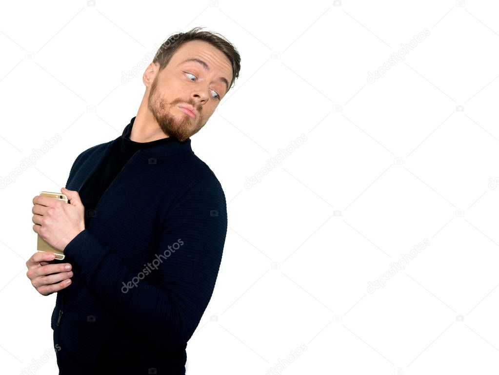 Portrait of a young casual man looking over the shoulder, isolated on a white background.