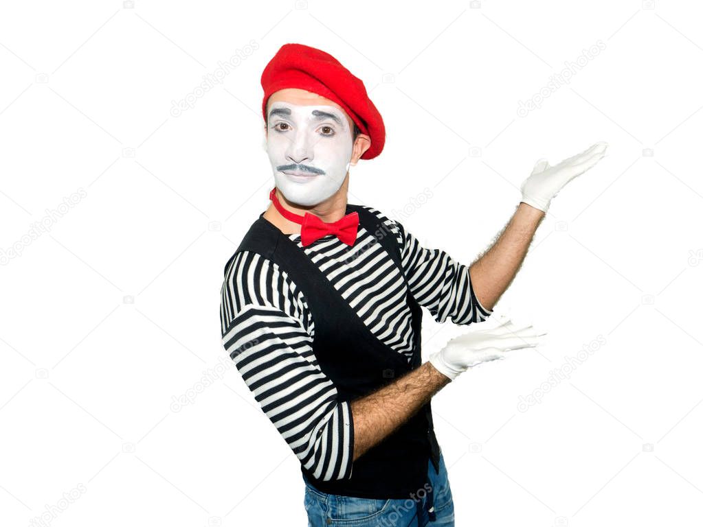 happy mime pointing aside isolated on white background.