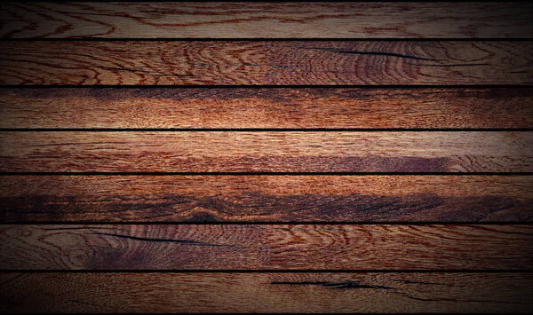 Old grunge dark textured wooden background, top view brown panel