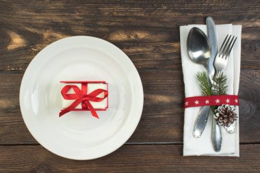 Holidays background with Christmas table place setting