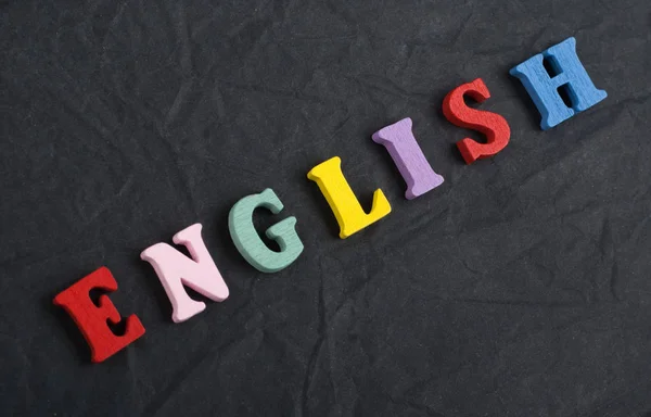 Angielski Słowo Czarnej Planszy Tło Składa Się Kolorowych Abc Alfabetu — Zdjęcie stockowe