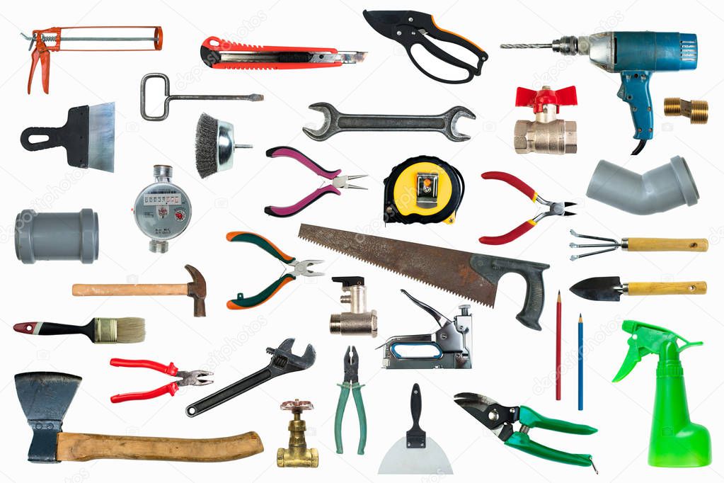 Tool collage isolated on a white background depicting carpentry and construction tools. Top view