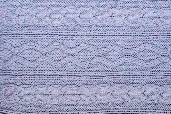 스웨터 스카프 커다란 뜨개질을 셔츠의 배경에 돋보기 패턴이 있습니다 뜨개질 — 스톡 사진
