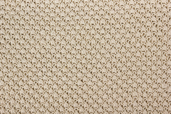 Свитер или ткань шарфа текстура большого вязания. Вязаный джерси фон с рельефным рисунком. Шерстяная ручная машина, ручная работа