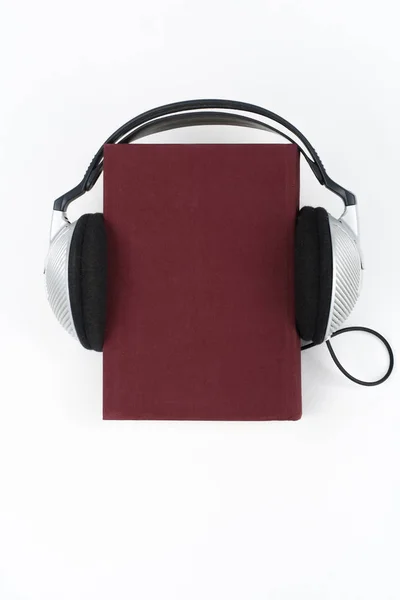 Audiobook White Background Headphones Put Blue Hardback Book Empty Cover — Stock Photo, Image