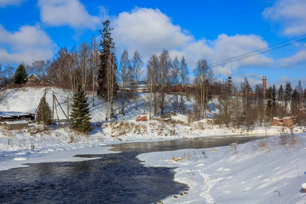 March rustic landscape on the river. River in spring. The Village in Russia