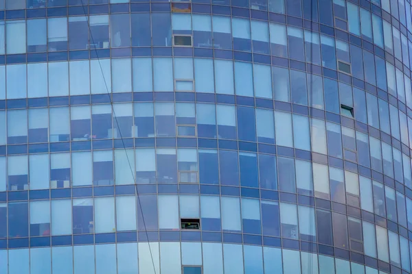 The windows of the blue business center. Large business center. The windows of the building. Blue Windows