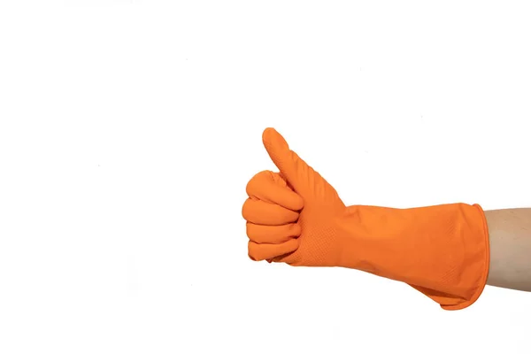 ようなオレンジ色のゴム手袋からバッジ サイン 指でシンボルをドラッグします 重いジェスチャーです 白い背景に分離 — ストック写真